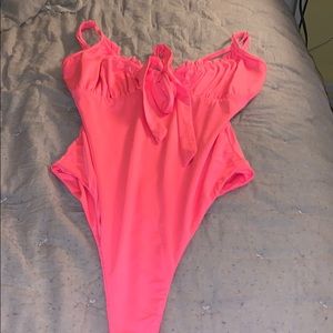 pink body suit